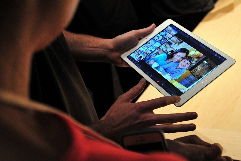 Apple показала нестандартные способы использования IPad | Фото: AFP