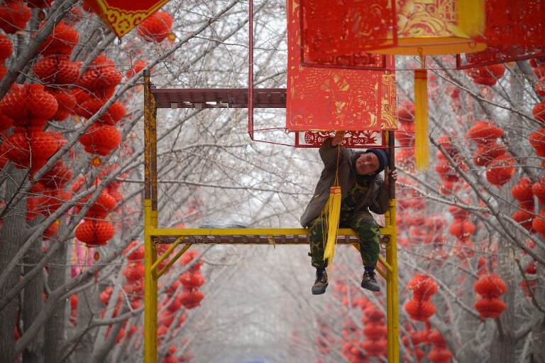 Китай готовится к Новому году | Фото: AFP