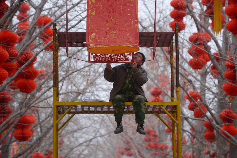 Китай готовится к Новому году | Фото: AFP