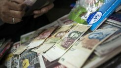 Аргентина: $2,000 – месячный лимит на покупку долларов | Фото: AFP
