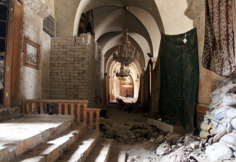 Войска Асада продолжают разрушать Алеппо | Фото: AFP