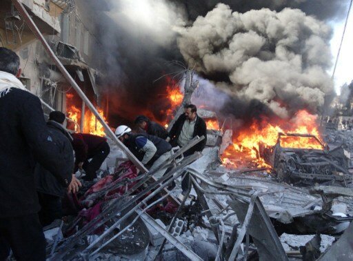Вертолетчики Асада отбомбились по Алеппо | Фото: AFP