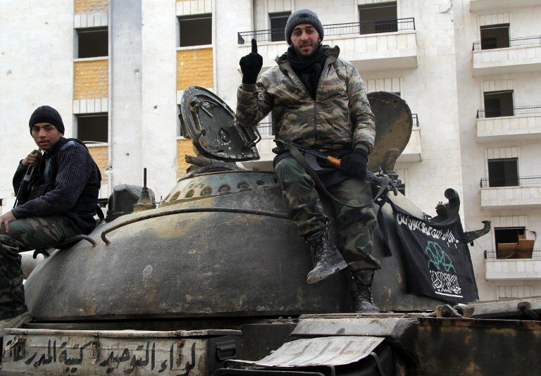 Сирийские боевики делят сферы влияния | Фото: AFP