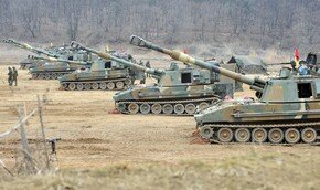 Южная Корея: игра в `танчики` | Фото: AFP