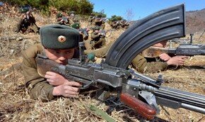 КНДР наступает, пока только в СМИ | Фото: AFP