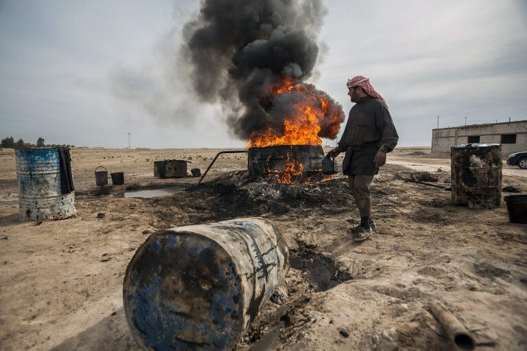 Сирийские повстанцы захватили военную базу в Хомсе | Фото: AFP