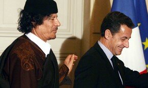 Париж начал разбирательство связей Саркози и Каддафи | Фото: AFP