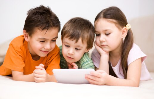 Игры на планшете замедляют развитие ребёнка | Фото: Thinkstock