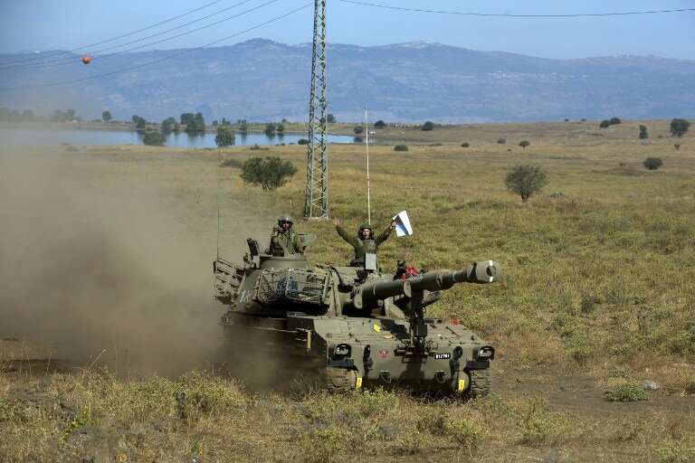 Маневры самоходной артиллерии ЦАХАЛа у сирийской границы | Фото: AFP