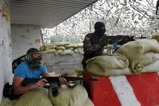 Украинских пограничников атаковали с обеих сторон границы | Фото: AFP