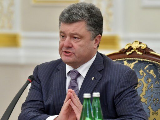 Путин обсудил с Порошенко ситуацию на востоке Украины | Фото: AFP