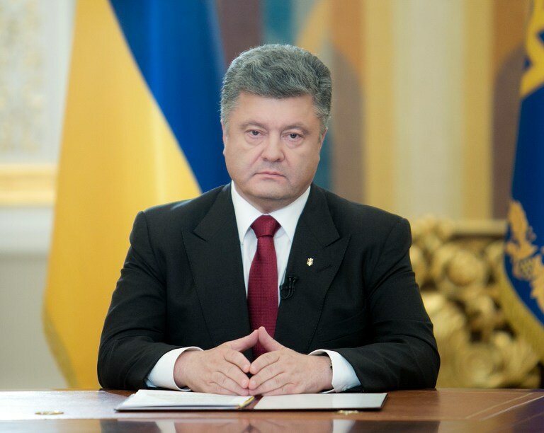 Порошенко считает, что Путин поддержал его план | Фото: AFP