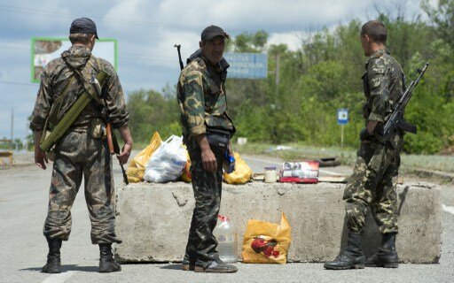 Украина. Бои в зоне АТО продолжаются | Фото: AFP