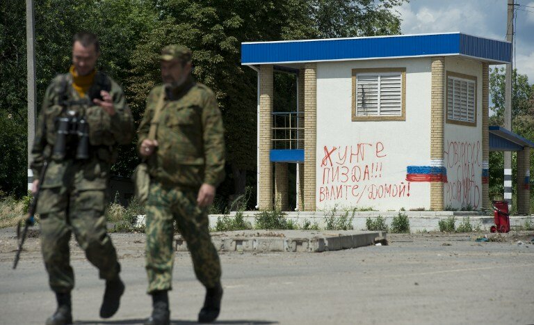 Боевики обстреливают силы АТО на Донбассе: 8 раненых, 1 убит | Фото: AFP