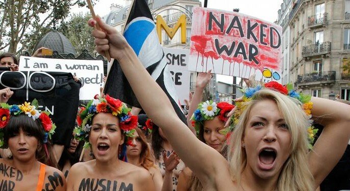 Активисток Femen суд выселяет из штаб-квартиры в Париже | Фото: AFP