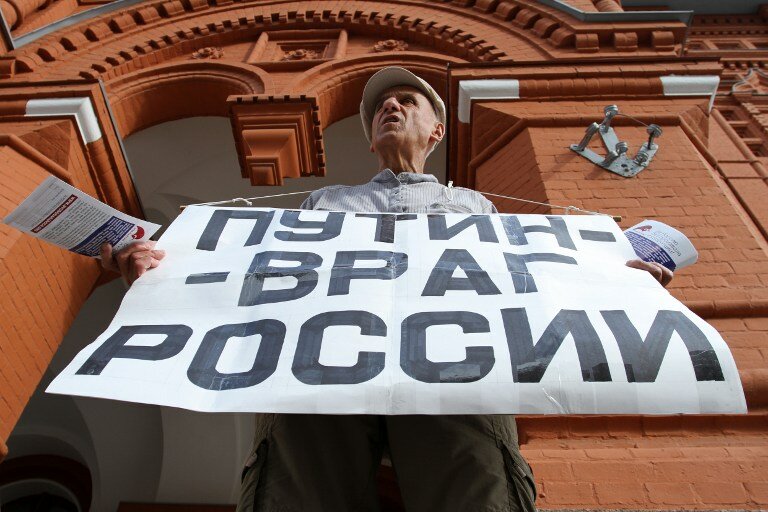Как били сторонников Навального. Часть II | Фото: AFP