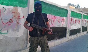Сирийская оппозиция расправилась с телеведущим | Фото: AFP