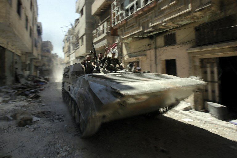 Сирия: Армия празднует 68-летие в разрушенной ею стране | Фото: AFP