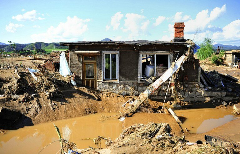 Последствия наводнения в Китае: 107 погибших | Фото: AFP