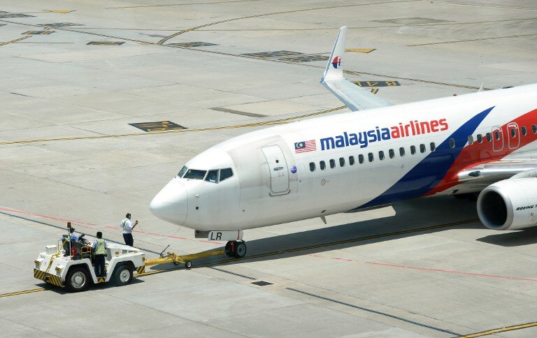 Malaysia Airlines временно выводит акции из обращения | Фото: AFP