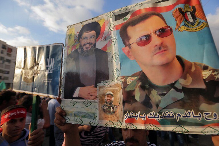 Защитники пророка в Бейруте: Шейх Насралла и еретик Асад | Фото: AFP