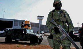 В тюрьме Ирака погибло 12 полицейких | Фото: AFP