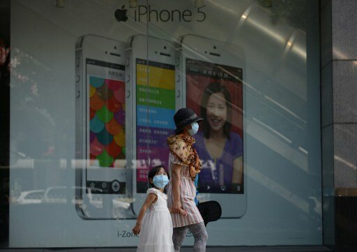 Новая операционка iOS 7 стала доступна для загрузки | Фото: AFP