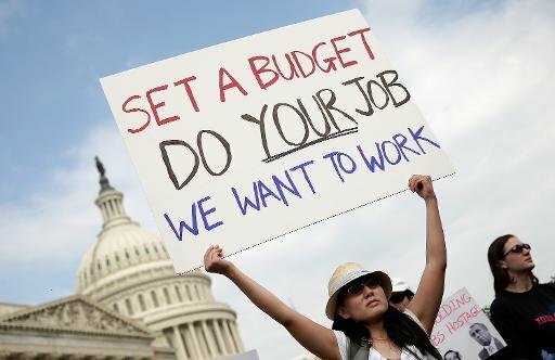 Ущерб экономике США от бюджетного кризиса обошелся в $2 млрд | Фото: AFP