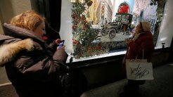 Приложение для смартфонов поможет шоппингу | Фото: AFP